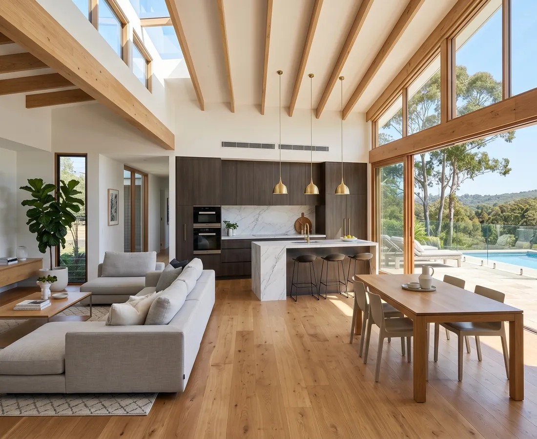 Beautifully renovated open-plan kitchen and living area featuring a marble island and seamless outdoor flow.